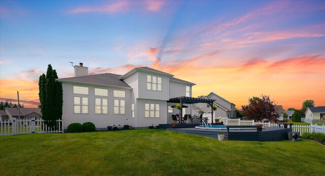 402 Cypress Ct, Saint Joseph, IL 61873 - back of property at dusk featuring a pergola and a chimney