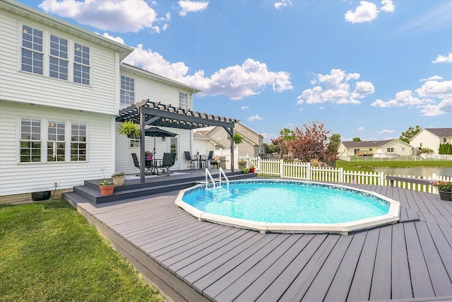 402 Cypress Ct, Saint Joseph, IL 61873 - view of pool with a pergola and a deck with water view