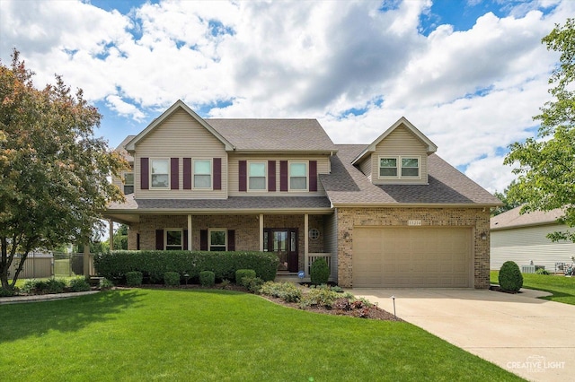13214 Sunderlin Rd, Plainfield, IL 60585 - view of front of property featuring brick siding, driveway, an attached garage, a shingled roof, and covered porch