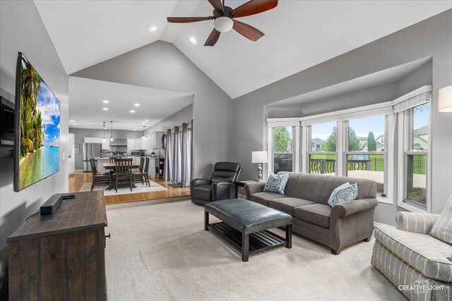 13214 Sunderlin Rd, Plainfield, IL 60585 - living area with ceiling fan, high vaulted ceiling, recessed lighting, and light colored carpet