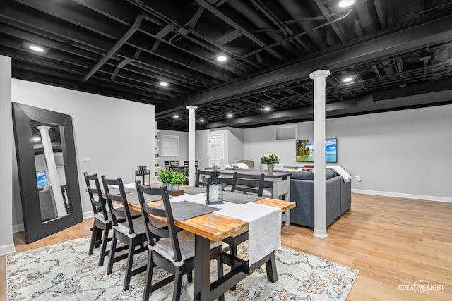 13214 Sunderlin Rd, Plainfield, IL 60585 - dining space featuring ornate columns, baseboards, and light wood-type flooring