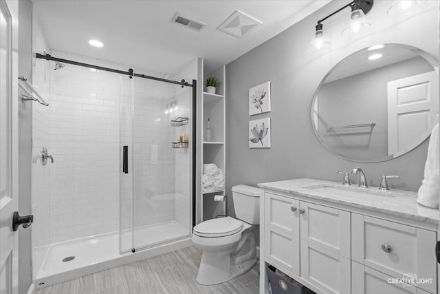 13214 Sunderlin Rd, Plainfield, IL 60585 - full bath featuring toilet, vanity, a shower stall, and recessed lighting