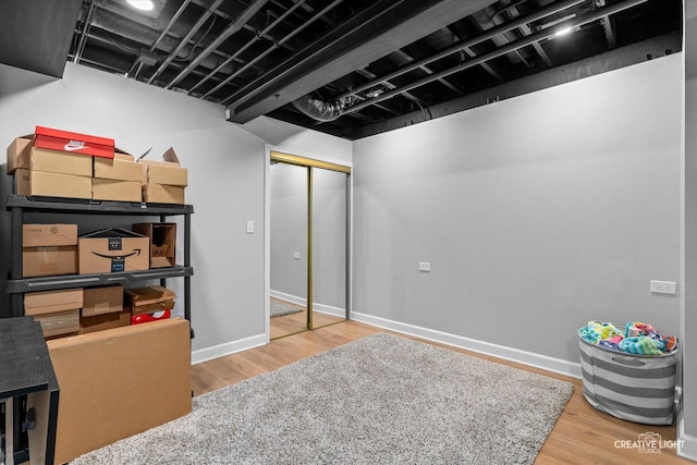 13214 Sunderlin Rd, Plainfield, IL 60585 - finished below grade area with wood finished floors and baseboards