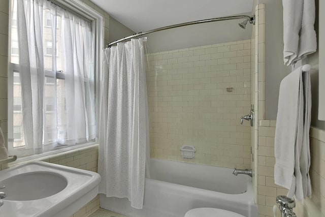 5555 N Sheridan Rd Unit 507, Chicago, IL 60640 - bathroom featuring shower / bath combo with shower curtain and toilet