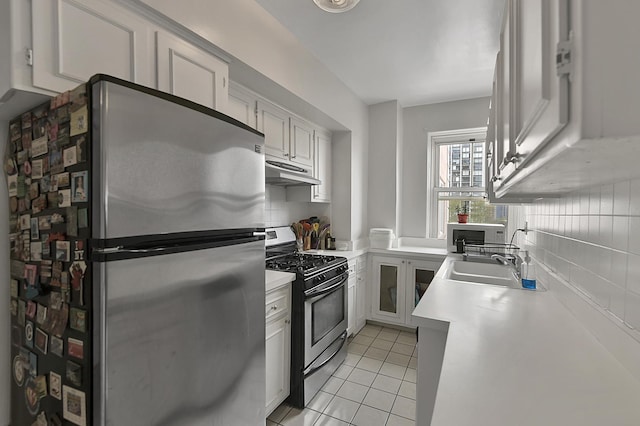 5555 N Sheridan Rd Unit 507, Chicago, IL 60640 - kitchen with stainless steel appliances, under cabinet range hood, light countertops, and tasteful backsplash