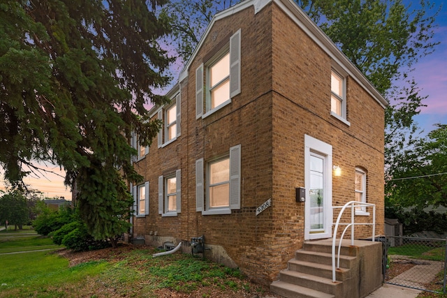 4308 Oak St, Bellwood, IL 60104 - property exterior at dusk with brick siding