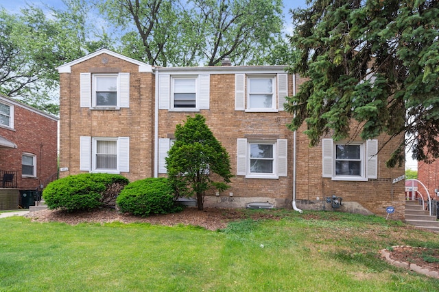 4308 Oak St, Bellwood, IL 60104 - view of front of property featuring a front yard and brick siding