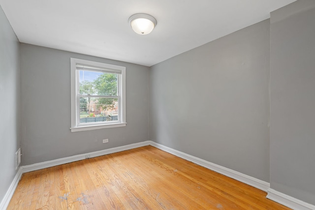 4308 Oak St, Bellwood, IL 60104 - empty room with light wood finished floors and baseboards