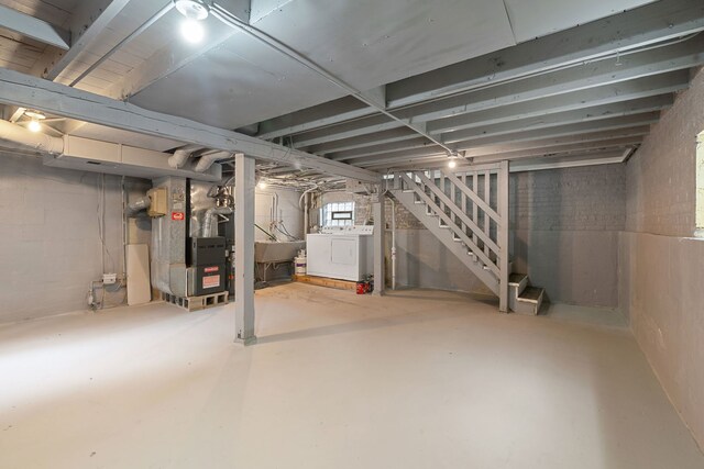 4308 Oak St, Bellwood, IL 60104 - below grade area featuring heating unit, stairway, and washer and clothes dryer