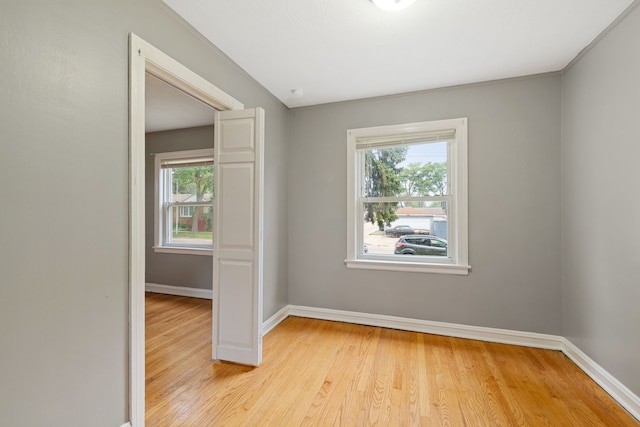4308 Oak St, Bellwood, IL 60104 - unfurnished room with light wood-style floors and baseboards