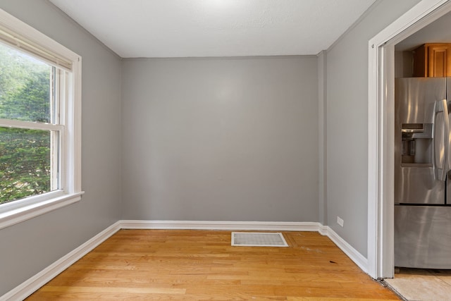 4308 Oak St, Bellwood, IL 60104 - empty room featuring light wood finished floors and healthy amount of natural light