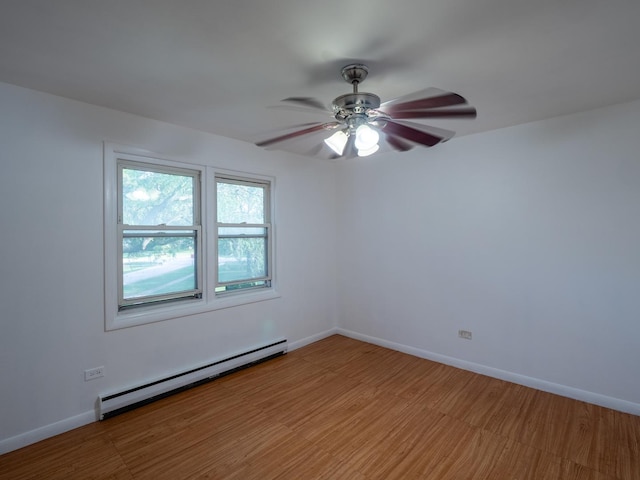 6862 W Lode Dr Unit 3A, Worth, IL 60482 - spare room with a baseboard radiator, ceiling fan, and baseboards