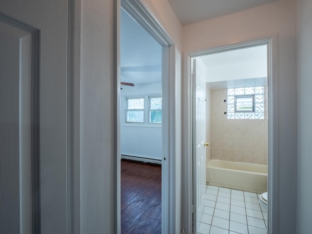 6862 W Lode Dr Unit 3A, Worth, IL 60482 - bathroom featuring baseboard heating, toilet, a bathtub, and wood finished floors