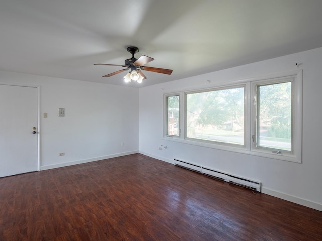 6862 W Lode Dr Unit 3A, Worth, IL 60482 - spare room featuring a baseboard radiator, ceiling fan, baseboards, and wood finished floors