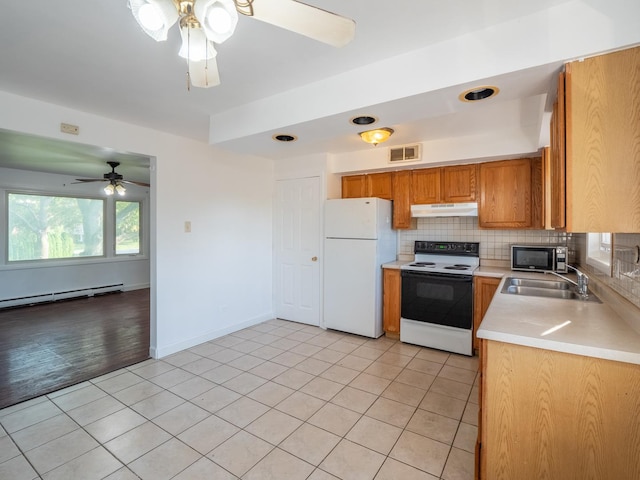 6862 W Lode Dr Unit 3A, Worth, IL 60482 - kitchen with freestanding refrigerator, range with electric stovetop, under cabinet range hood, ceiling fan, and a sink