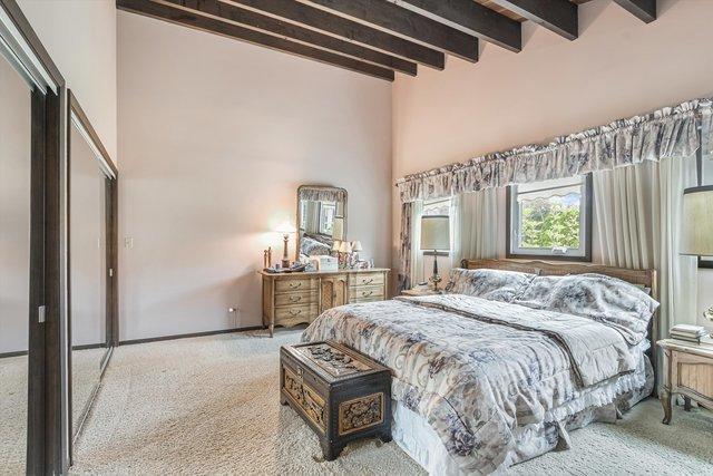 1314 S Chester Ave, Park Ridge, IL 60068 - bedroom featuring carpet flooring, beamed ceiling, and a towering ceiling