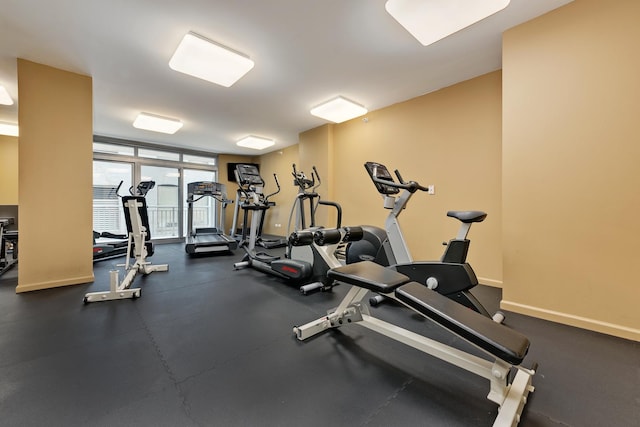 125 S Jefferson St Unit 710, Chicago, IL 60661 - exercise room featuring baseboards and floor to ceiling windows
