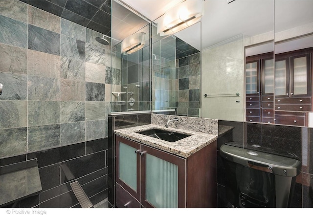 1 E Schiller St Unit 8B, Chicago, IL 60610 - full bath featuring tile walls, vanity, a walk in shower, and toilet