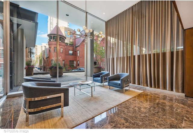 1 E Schiller St Unit 8B, Chicago, IL 60610 - community lobby with a high ceiling and expansive windows