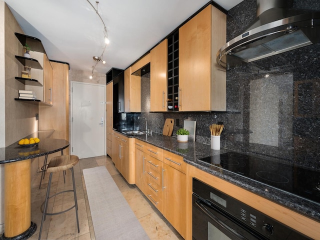 1 E Schiller St Unit 8B, Chicago, IL 60610 - kitchen featuring ventilation hood, black appliances, open shelves, decorative backsplash, and a kitchen bar
