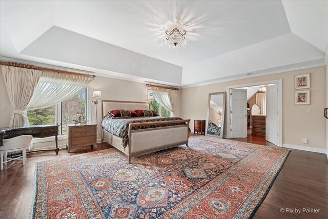 11 Moate Ln, Barrington Hills, IL 60010 - bedroom with multiple windows, a tray ceiling, wood finished floors, and baseboards