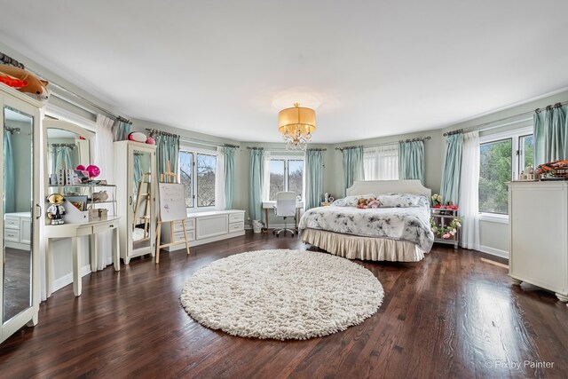 11 Moate Ln, Barrington Hills, IL 60010 - bedroom featuring multiple windows, wood finished floors, a chandelier, and baseboards
