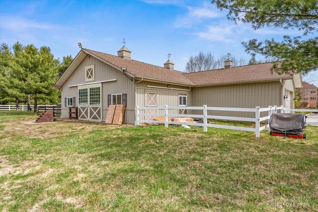 11 Moate Ln, Barrington Hills, IL 60010 - rear view of property featuring a shingled roof and a chimney