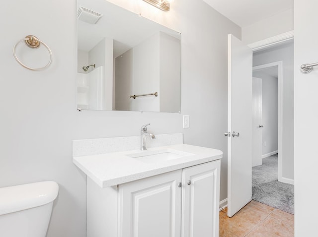 3411 Caton Farm Rd, Joliet, IL 60431 - bathroom featuring vanity, toilet, tile patterned flooring, and baseboards