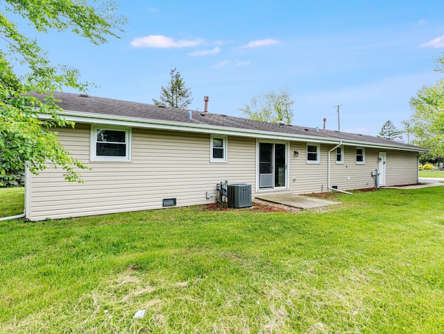 3411 Caton Farm Rd, Joliet, IL 60431 - back of property with a lawn, central AC, and a patio