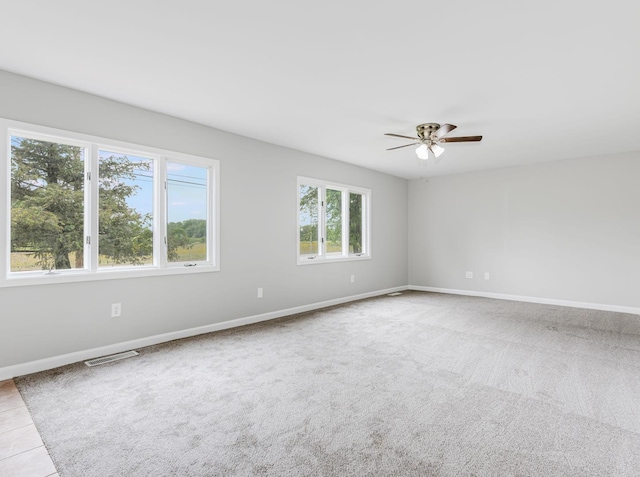 3411 Caton Farm Rd, Joliet, IL 60431 - carpeted empty room featuring ceiling fan and baseboards