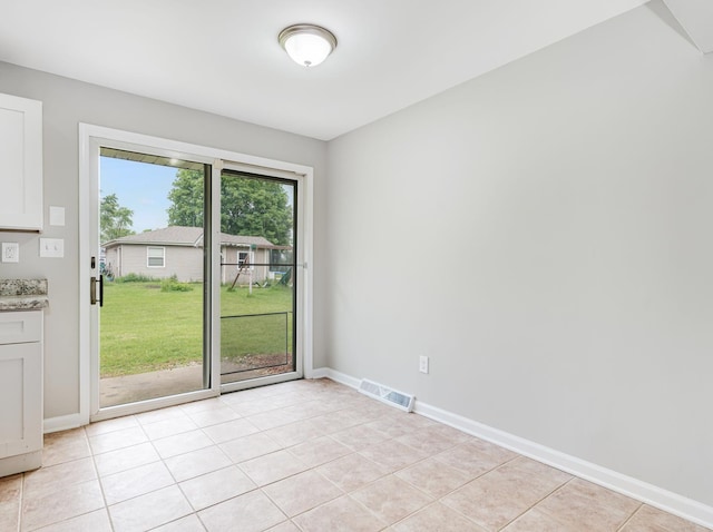 3411 Caton Farm Rd, Joliet, IL 60431 - unfurnished dining area featuring baseboards and light tile patterned floors