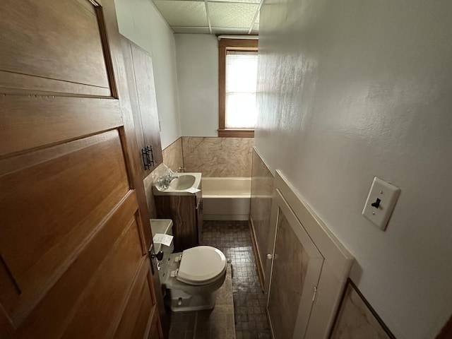 347 156th St, Calumet City, IL 60409 - bathroom with a tub, toilet, tile patterned floors, and vanity