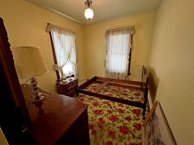 347 156th St, Calumet City, IL 60409 - bedroom with multiple windows and a baseboard radiator