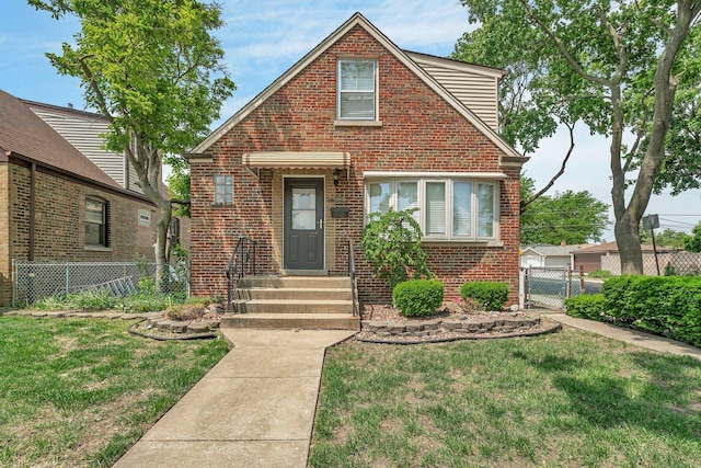 5200 S Newcastle Ave, Chicago, IL 60638 - view of front of house with brick siding and a gate