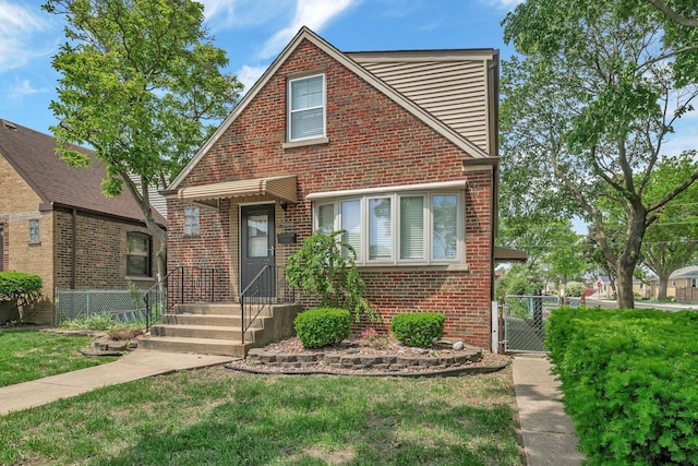 5200 S Newcastle Ave, Chicago, IL 60638 - view of front facade featuring brick siding and a gate