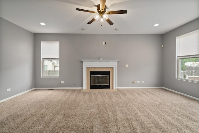 8013 Shady Oak Rd, Joliet, IL 60431 - unfurnished living room featuring light colored carpet, a ceiling fan, a fireplace, baseboards, and recessed lighting