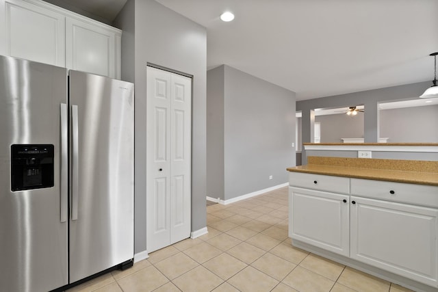 8013 Shady Oak Rd, Joliet, IL 60431 - kitchen with stainless steel fridge, white cabinets, baseboards, ceiling fan, and recessed lighting
