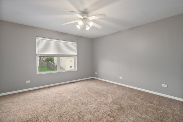 8013 Shady Oak Rd, Joliet, IL 60431 - carpeted spare room with ceiling fan and baseboards