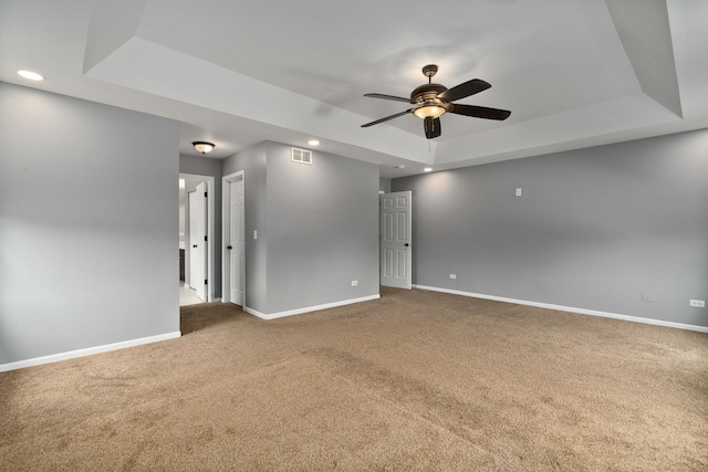 8013 Shady Oak Rd, Joliet, IL 60431 - unfurnished room with a tray ceiling, carpet flooring, baseboards, ceiling fan, and recessed lighting