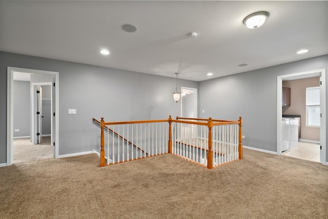8013 Shady Oak Rd, Joliet, IL 60431 - corridor with an upstairs landing, light carpet, baseboards, recessed lighting, and washer / dryer