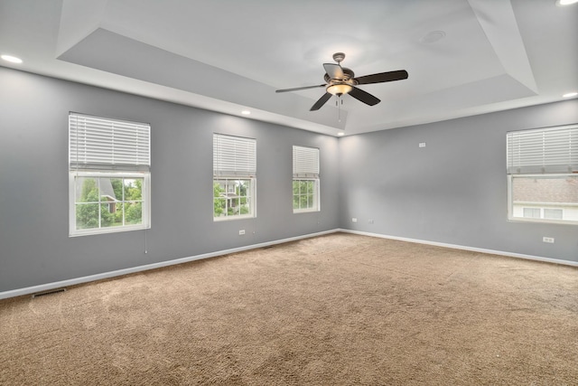 8013 Shady Oak Rd, Joliet, IL 60431 - carpeted empty room featuring a raised ceiling, baseboards, ceiling fan, and recessed lighting