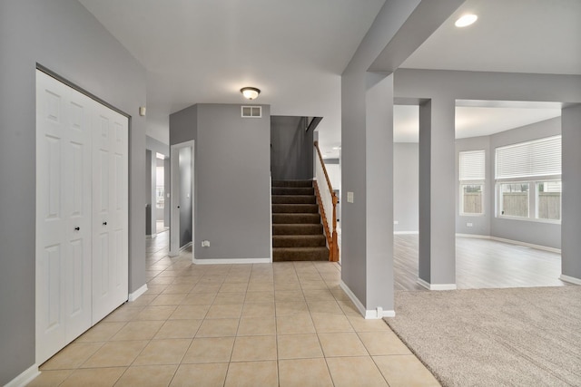 8013 Shady Oak Rd, Joliet, IL 60431 - foyer featuring stairs, baseboards, light tile patterned floors, and recessed lighting