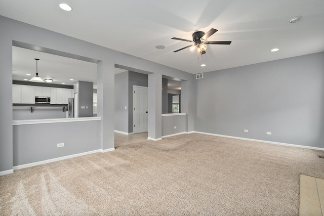 8013 Shady Oak Rd, Joliet, IL 60431 - unfurnished living room featuring light carpet, ceiling fan, baseboards, and recessed lighting