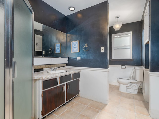 2571 Forest View Ave, River Grove, IL 60171 - full bath featuring tile patterned floors, a wainscoted wall, vanity, and a shower with shower door