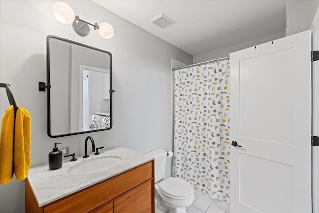 2943 N Lincoln Ave Unit 202, Chicago, IL 60657 - bathroom with vanity, a shower with curtain, and tile patterned floors