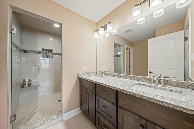 10749 Revere Cir, Mokena, IL 60448 - full bathroom with double vanity, a stall shower, and tile patterned flooring