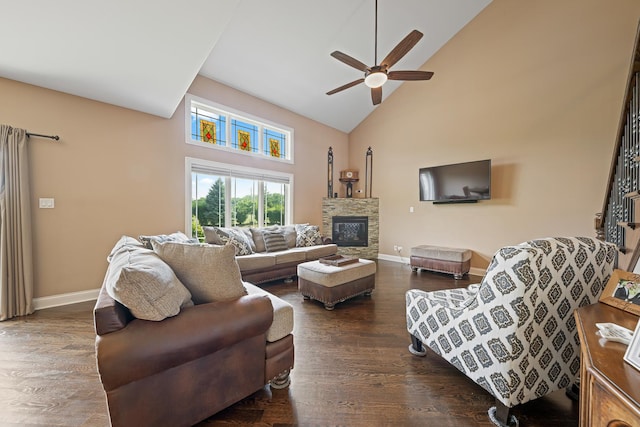 10749 Revere Cir, Mokena, IL 60448 - living area with high vaulted ceiling, a ceiling fan, a stone fireplace, and dark wood-type flooring