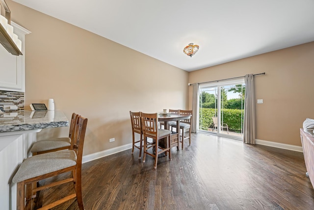 10749 Revere Cir, Mokena, IL 60448 - dining area with dark wood-style flooring and baseboards