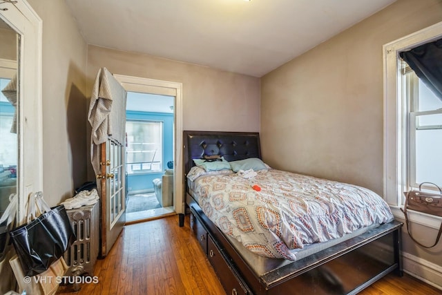 22 S Austin Blvd, Oak Park, IL 60302 - bedroom with wood finished floors, multiple windows, and french doors