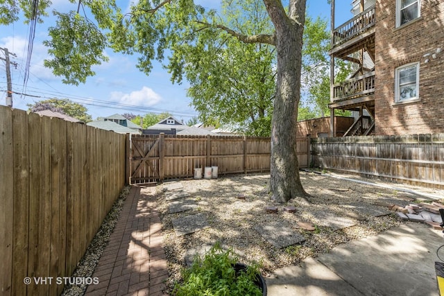 22 S Austin Blvd, Oak Park, IL 60302 - fenced backyard with a balcony